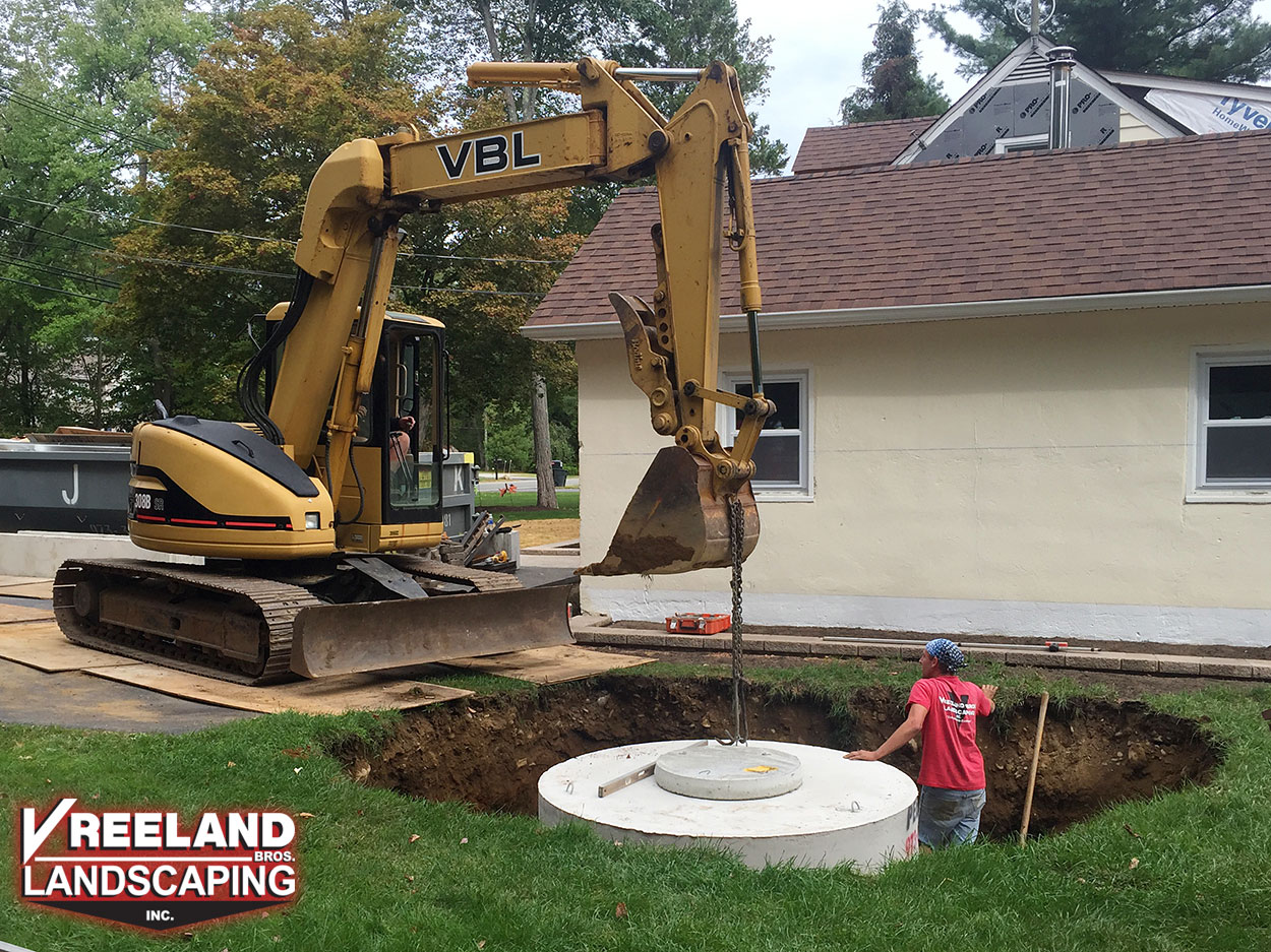 Oak Ridge, NJ, Seepage pit installation for use as a drywell in a full site drainage application 