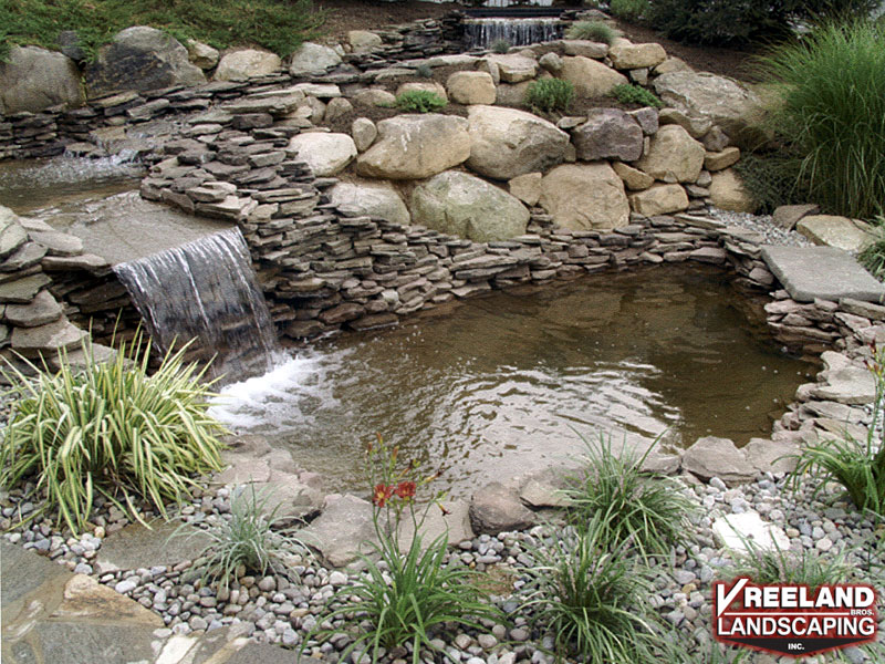 Oak Ridge, NJ, Waterfalls, pond, and landscaping added to existing pool 